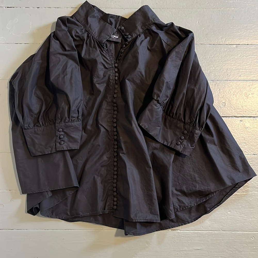 THE KOOPLES swing blouse with high neck and button detail.